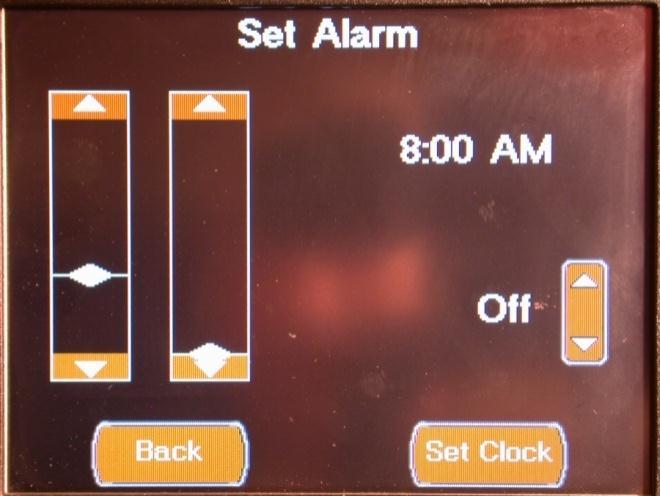 Pressing the Alarm Button will take you to the Alarm Clock page. On this page are two scroll bars that allow you to set the time of day for the alarm.
