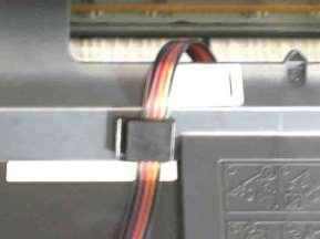 We recommend that you manually move the printer head back and forth to see if the tubing interferes with its path. 11.