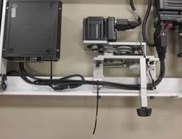 Connect the new black cable harness to the X-axis motor and route the cable back toward the rear of the