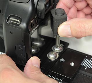 You must loosen the 2 screws slightly of the offset mounting plate in order to shift the camera from side to side.