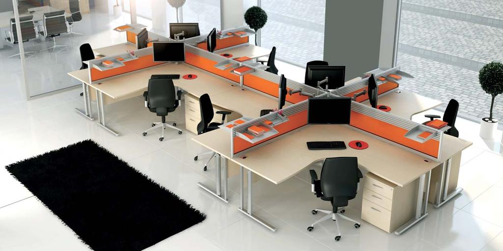 Symmetrical Desking Symmetrical desks offer the user additional working space with ergonomic benefits. This footprint is flexible and can be configured in single applications as well as groups.