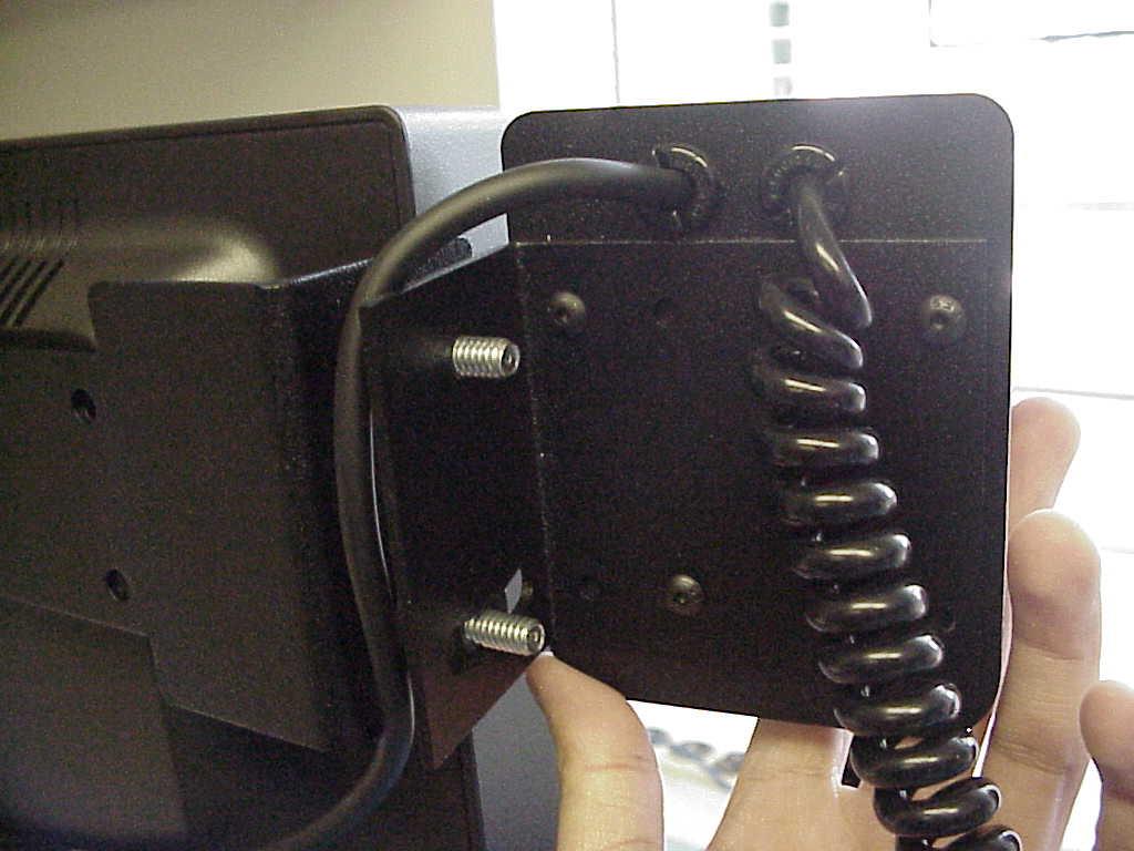 Install the handset cradle on this bracket,