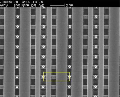 Memory Block Analysis 4-5 Figure 4.3.3 and Figure 4.3.4 are plan-view SEM images of the EEPROM at poly and metal 1, respectively.