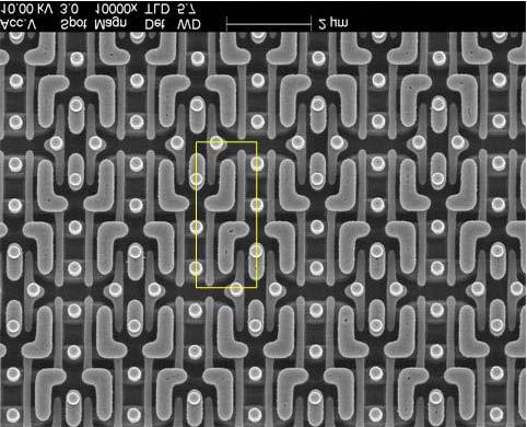 Memory Block Analysis 4-7 Figure 4.3.5 and Figure 4.3.6 are plan-view SEM images of the 6T SRAM at poly and metal 1, respectively. Each 6T SRAM cell is 3.44 µm long by 1.