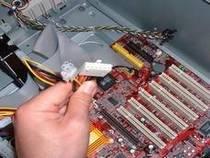 Bay Figure 17: Inserting the hard drive into the drive tray 3) Screw it in securely on both sides. 4) Attach the power cable to the drive.
