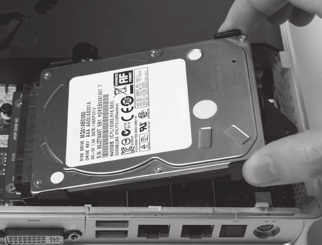 3. Insert the hard disk or SSD