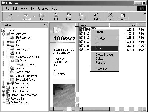On your computer's desktop display, select [My computer] and double click [Removable Disk DCIM 100SSCAM]. The image files will then be displayed. 3.