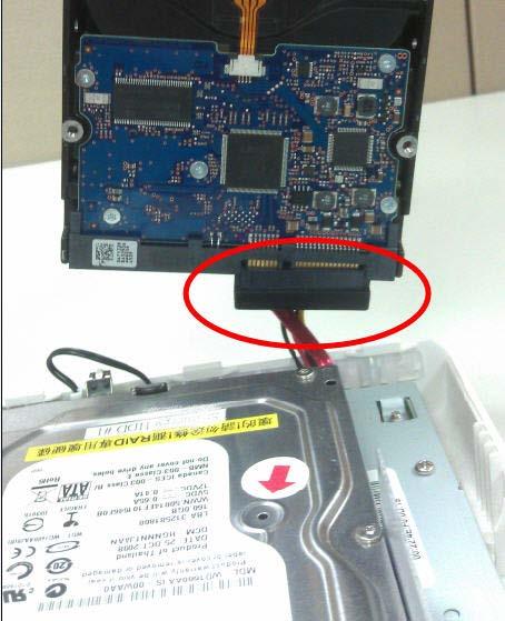 by attaching it to the corresponding SATA