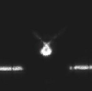Light stripe in bottom of images is undeflected part of laser plane which does not pass through droplet. In a dark spot of these images the droplet located.