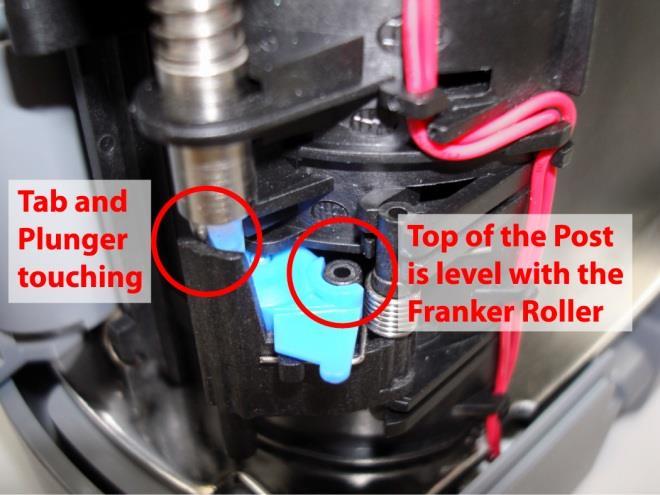 Step 3: Holding the Franker Roller (as shown), slide the Roller onto the Post.