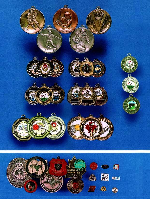 Page 22 M-2042 MEDALLIONS M-2900 M-2322 LARGE 2.5 DIE-CAST HAND FINISHED MEDALS M-2162 AVAILABLE IN MOST MAJOR SPORTS 8.00 M-2602 M-27-2.95 M-25-2.95 ACTIVITY INSERTS (IN MOST SPORTS) M-24-2.