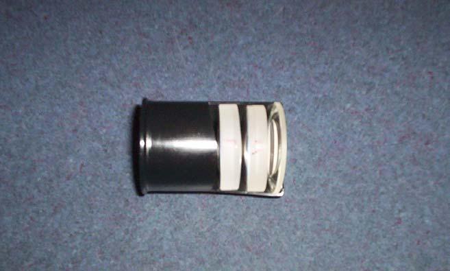 F M E to telescope viewing end Image #2: Film canister cut-away showing order and orientation of
