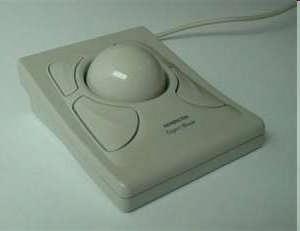 MOUSE Mechanical mouse: uses hard rubber ball that rolls as the mouse is