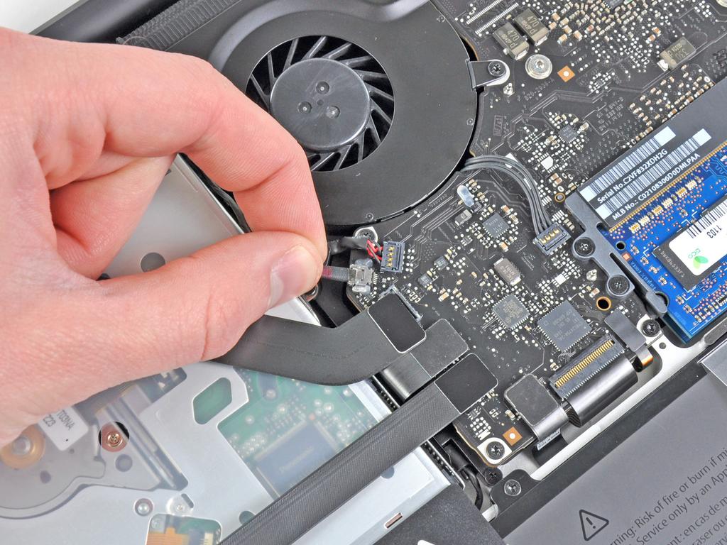 Carefully pull the camera cable out of its socket on the logic board.