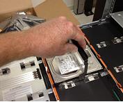 Hardware installation procedures Installing disk drives into a Primary Shelf or an Expansion Shelf 41 Make sure that the bottom of the disk is seated completely.