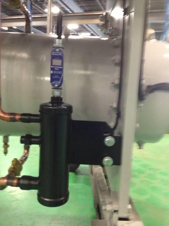 Level control chamber directly measure refrigerant in vessel Smardt