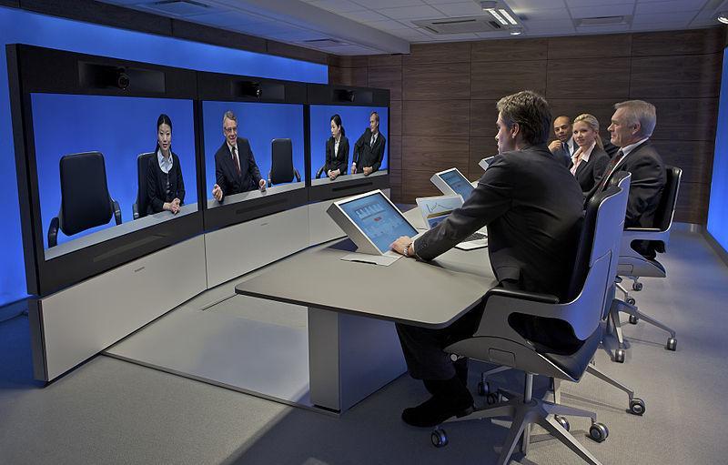 Videoconferencing Videoconference is a meeting where people at two or more locations communicate by simultaneous two-way video and audio transmissions A