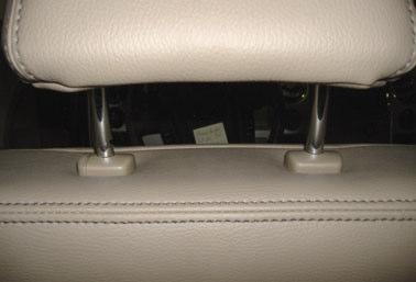 6. Remove driver s side headrest by depressing B6 release buttons on each post coupler and pulling up on the headrest. ( B6) 7.