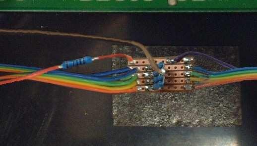 Solder a brown wire to the end of the resistor cluster as shown.