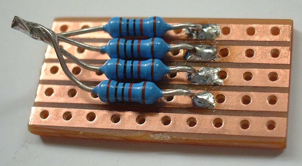 Solder the other loose ends to the veroboard in the position on the board as shown below: 3) Take a 9 length of rainbow