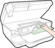Move the carriage to the left, locate any jammed paper inside the printer on the right side of the carriage, free any paper scraps or wrinkled paper, and pull the paper towards you through the front