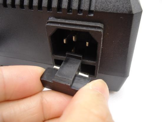 4. Insert the fuse holder back into the power adapter and push until it locks into place.