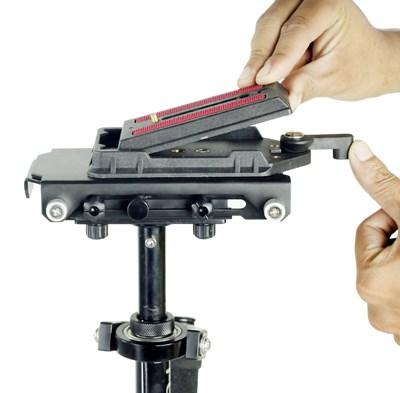 Insert your camera setup with Quick Release Plate into quick release adapter and