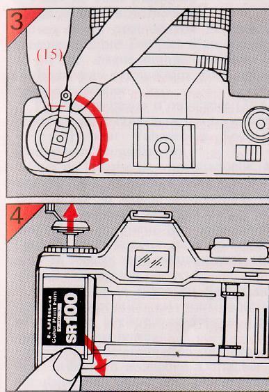 3) Flip up the film rewind crank (15) and turn it in the direction of the arrow.