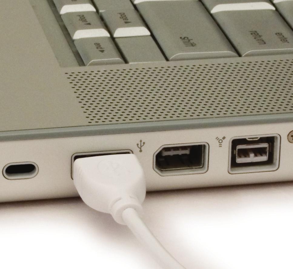 Then, connect a USB or firewire cable into a matching port on the back of