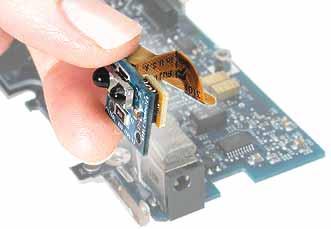 14. Remove the single Torx T6 screw from the metal bracket holding the infrared communications board. 15.