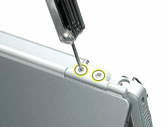 Procedure 1. With the computer on a soft cloth, remove the two identical screws from the top case. 2.