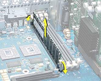Procedure 1. Push down the ejectors on the DIMM slot. 2. Holding the DIMM by both top corners, lift it straight up out of the server.