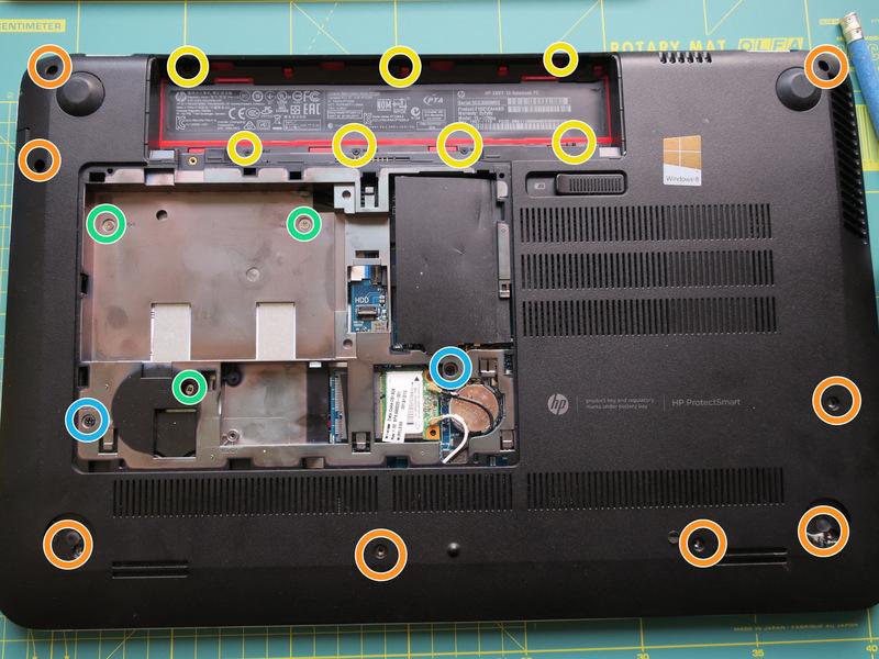 Remove seven 1,6x2 screws from the battery compartment.