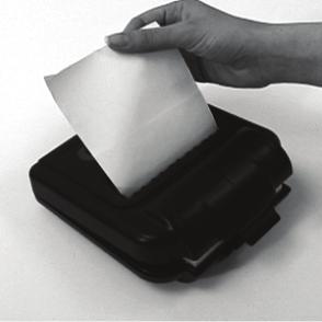 Feed the paper through the printer's cover