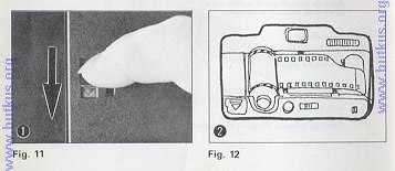 LOADING THE FILM 1. Push the back cover lever downwards in the direction of the arrow to open. (Fig. 11) 2.