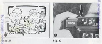 3. Now return the camera to its former position so that both people are in the Field of View Frame again, then press the Shutter Release Button fully to take the picture. (Fig. 21) (Fig.