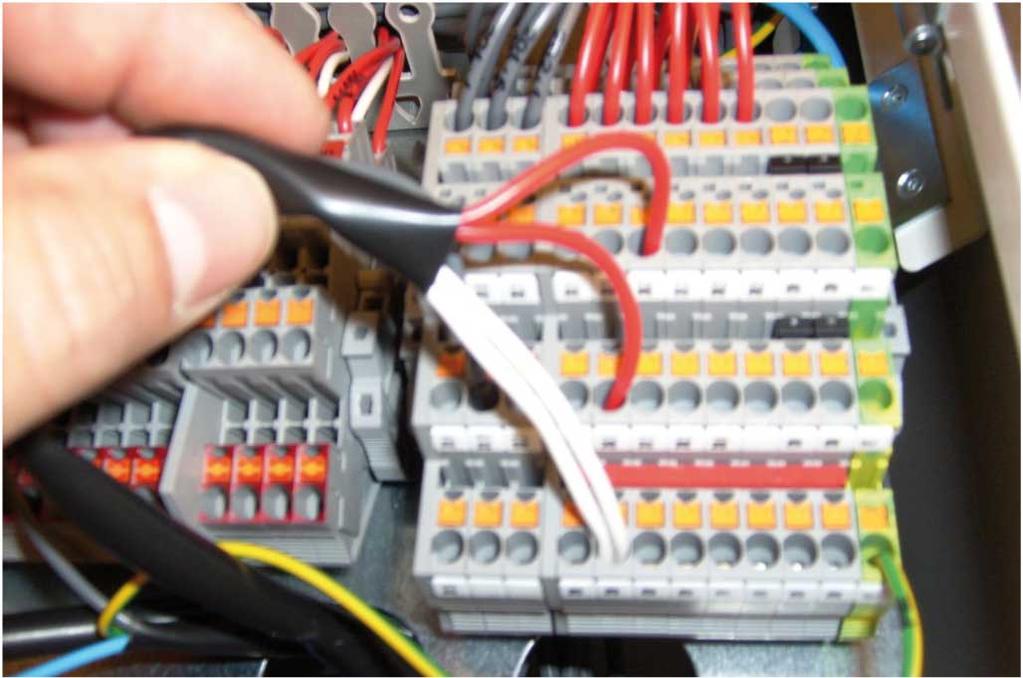 . Reconnect the 0-0 V and alarm to the expansion board by connecting the wires as follows: Wires which were connected to the X terminal block, marked 6.
