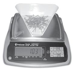 TC-210 SERIES BENCH SCALE TC-210 Light Tower Weighing, Counting, and Over/Under Checkweighing All-In-One! High weight display & counting resolution.
