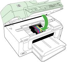 10. Using the colored shaped icons for help, slide the ink cartridge into the empty slot until it clicks into place and is seated firmly in the slot. 11. Close the ink cartridge door.