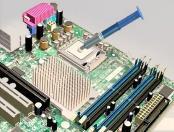 Attach Components to the Motherboard CPU on Motherboard The CPU and motherboard are sensitive to electrostatic discharge. Take precautions.