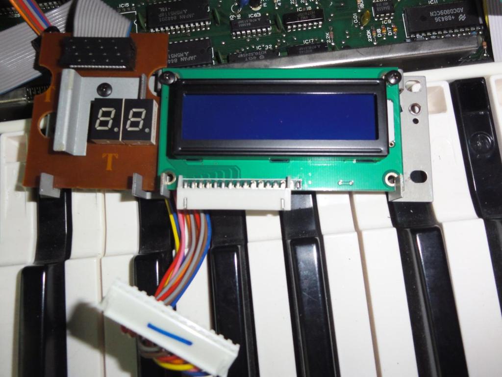 Fig. 6 - The backlit LCD in place of the original Step 5: Now that the original LCD has been removed place the backlit LCD replacement into the LCD bracket.