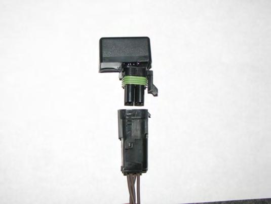 Figure 4. Power relay connection 3. Use the power cable (P/N: 4002016-22) to connect to 12V battery power at power terminals in the cab or at the battery.