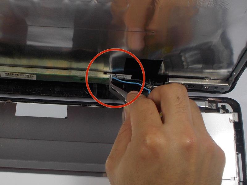 laptop, and detach connection with tweezers by pulling back