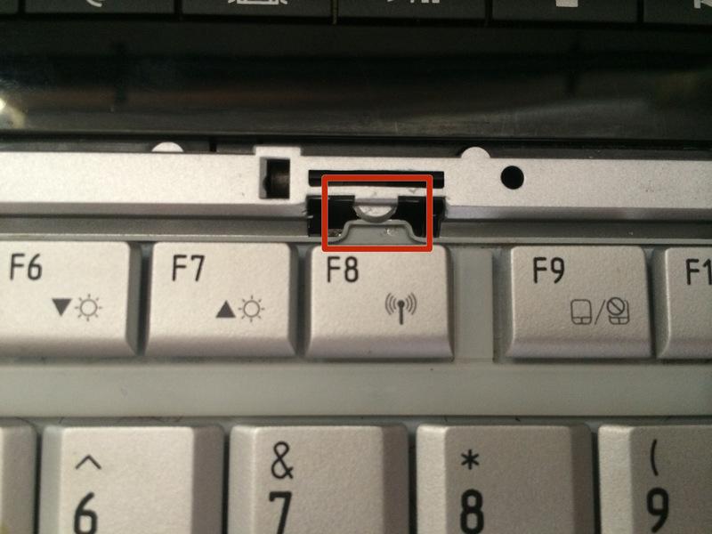 Step 5 Find the latch above the F8 key
