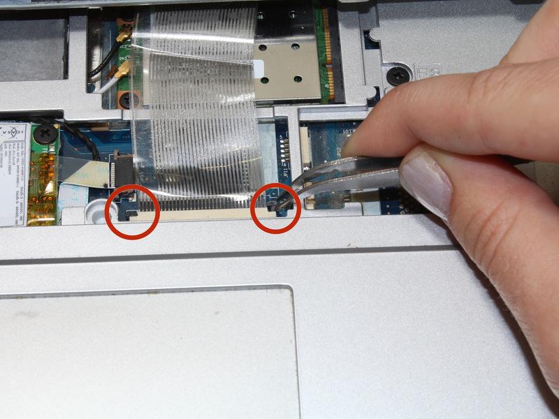 Step 7 Find the ribbon cable that connects the