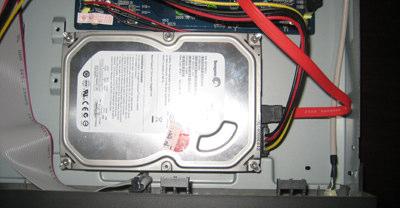 Place the HDD on the bottom case
