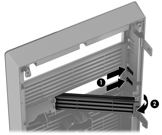 25-inch bezel blank, press inward on the two retaining tabs on the side of the bezel blank that hold the bezel blank in place (1) and rotate the bezel blank back to