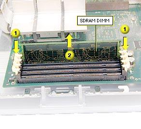 Take Apart SDRAM DIMM - 58 1. Push down on the connector clips to unlock the DIMM. 2. Holding the DIMM by both top corners, lift straight up out of the slot.