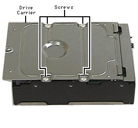 Take Apart Hard Drive, Ultra2 LVD SCSI - 73 8. If you re returning the drive to Apple, you must also remove the hard drive carrier. Remove the four screws from the carrier and lift out the drive.