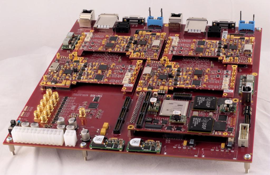 3 System Photograph A typical system showing the SMT166 FPGA carrier board, four SMT943 quad ADCs,